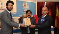 Sahibzada Sultan Ahmad Ali, Dr. Ashfaq Rana,Presenting Shield to Dr. Elbayi Magusdov
