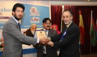 Sahibzada Sultan Ahmad Ali, Dr. Ashfaq Rana, Presenting Shield to M. Afsar Rabeen
