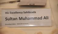 Name tag of His Majesty Sahibzada Sultan Muhammad Ali Founding Father MUSLIM Institute stage