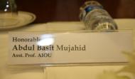Name tag of Assistant Professor AIOU Dr. Abdul Basit Mujahid