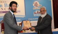 Sahibzada Sultan Ahmad Ali Chairman MUSLIM institute Presenting Shield to Justice (R) Munir A. Mughal