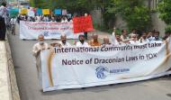 Participants In a Walk on Kashmir issue organized by MUSLIM Institute on Saturday July 23, 2016