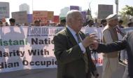 Former Secy. Gen. for Foreign Affairs Mr. Akram Zaki talking to participants of rally
